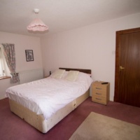 Double bedroom at Victoria Cottage, Moray Coast, Scotland