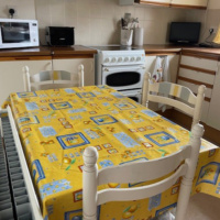 Moray Coast. Holiday accommodation. Dining table at Pulteney Cottage.