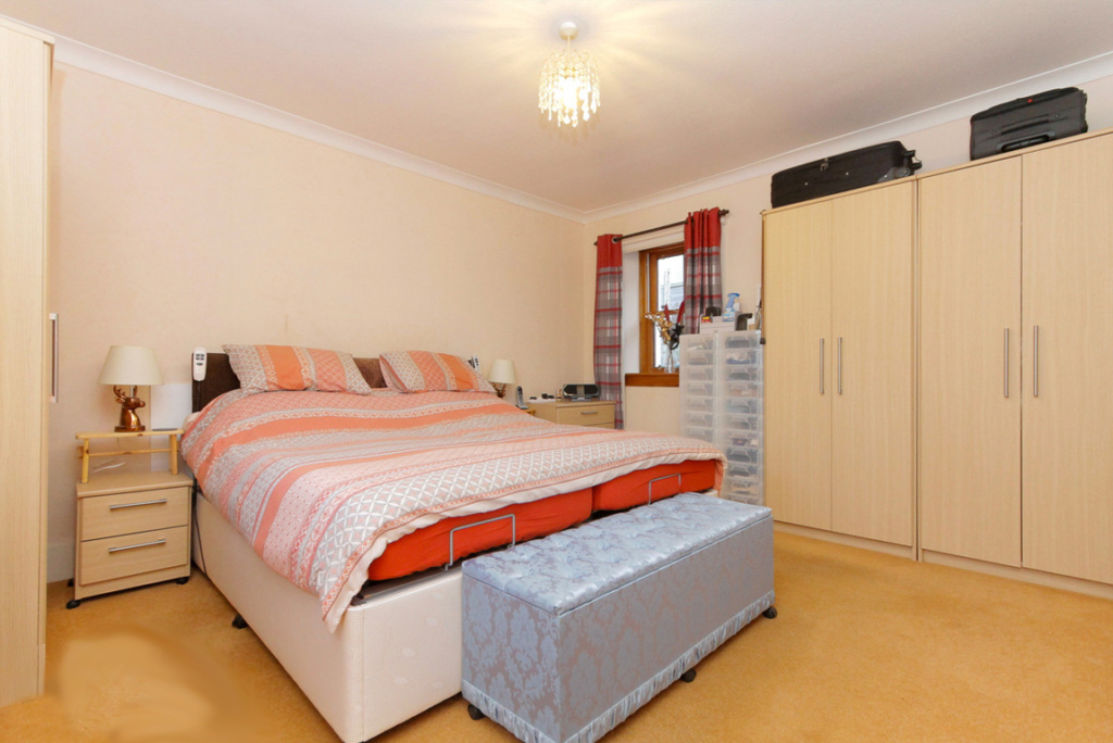 Double downstairs bedroom at Pulteney Cottage. Moray Coast, Scotland.